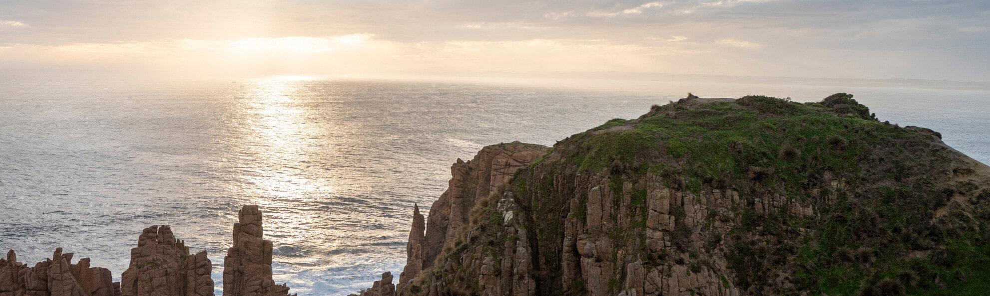 Sun rising over sea view
