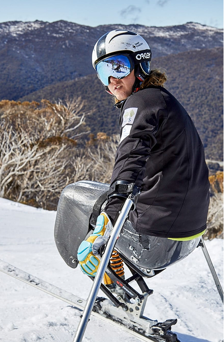 Adaptive skier on snowy slope at Thredbo, Kosciuszko National Park, Australia