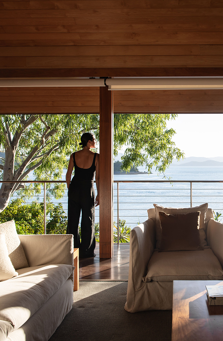 Relaxed person enjoying ocean views from their balcony