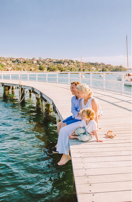 Snorkeller swimming above coral at the Great Barrier Reef