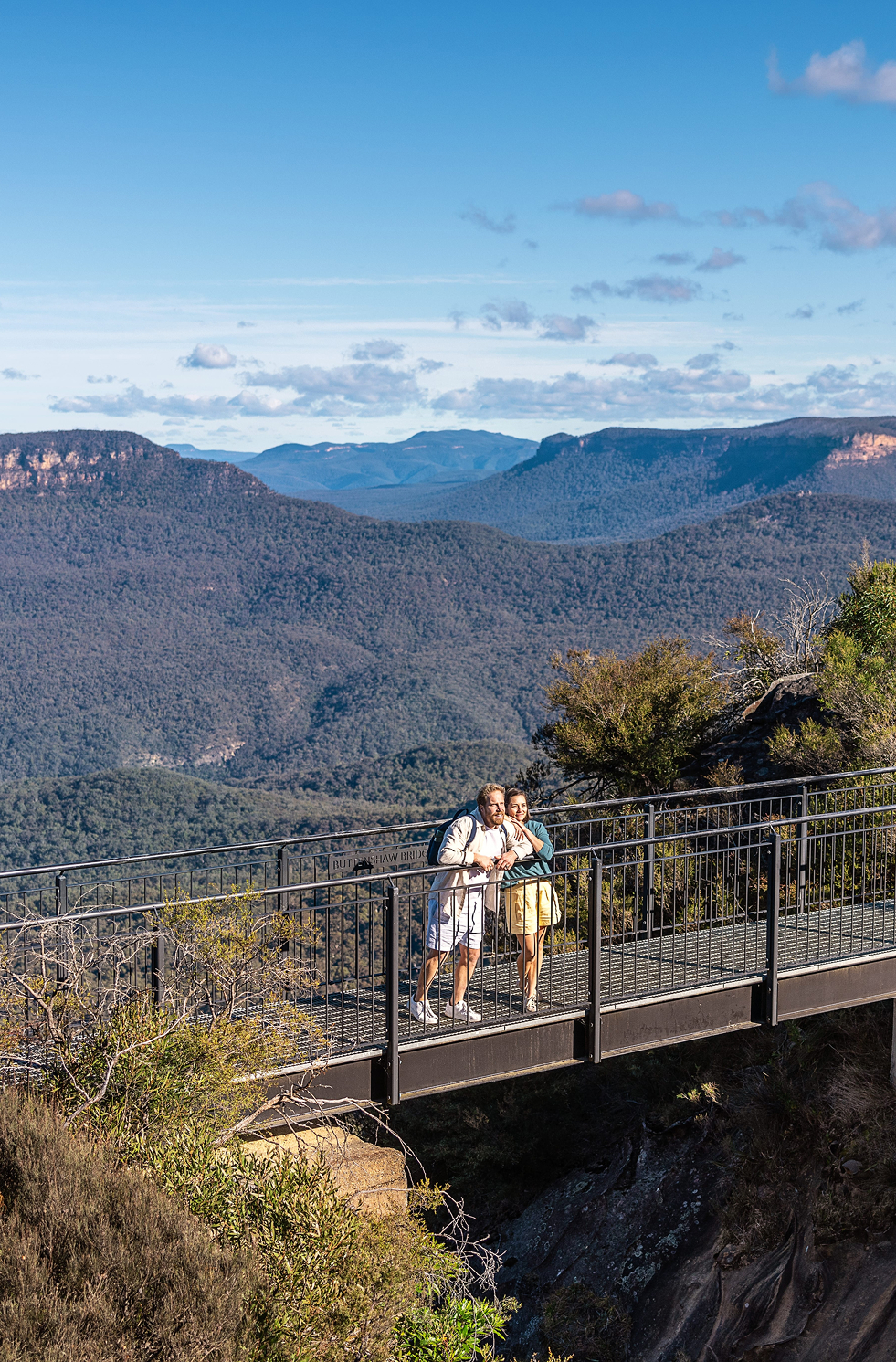 Couple admiring panoramic views of the Blue Mountains