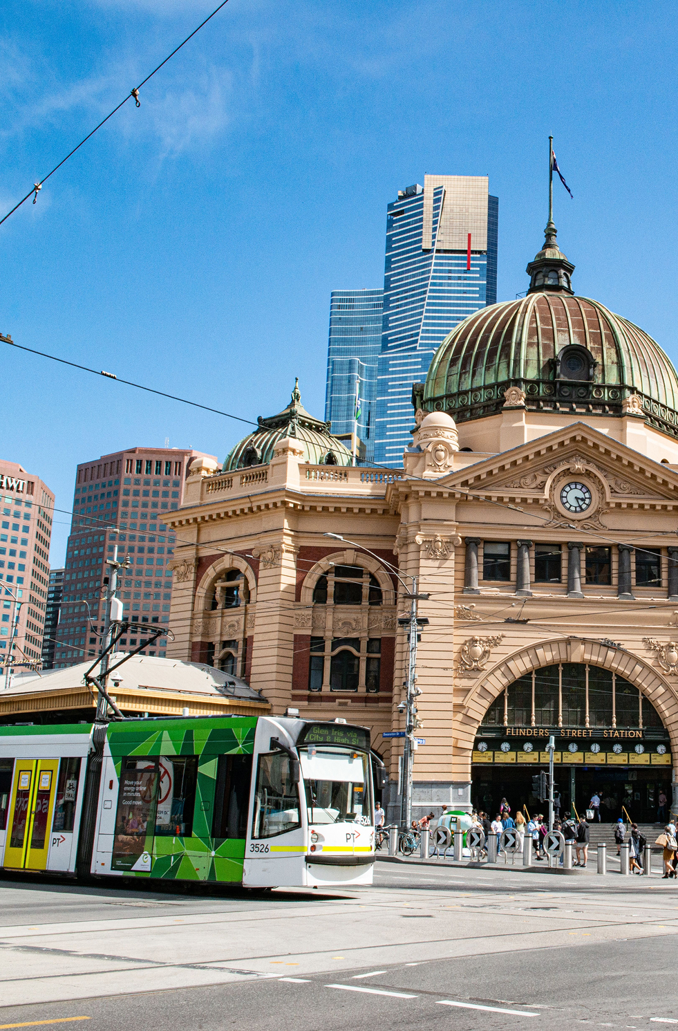 Tram pulling into Emily Godfrey Flinders Street Station in Melbourne.