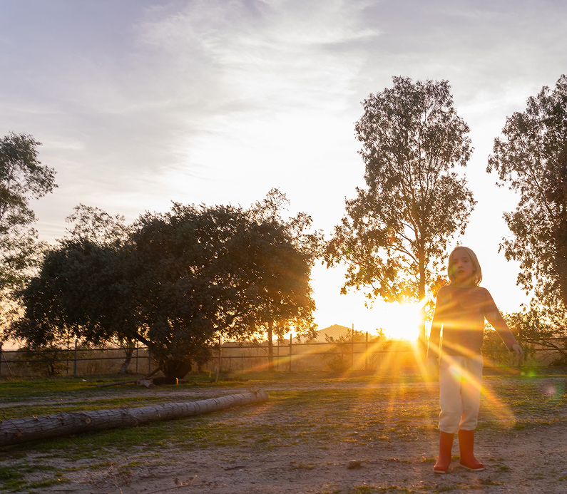Child-in-nature-at-sunset