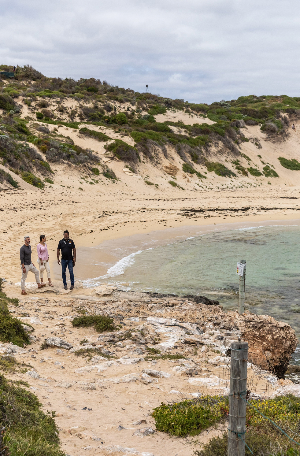 People walking on a beach in Freemantle, Perth