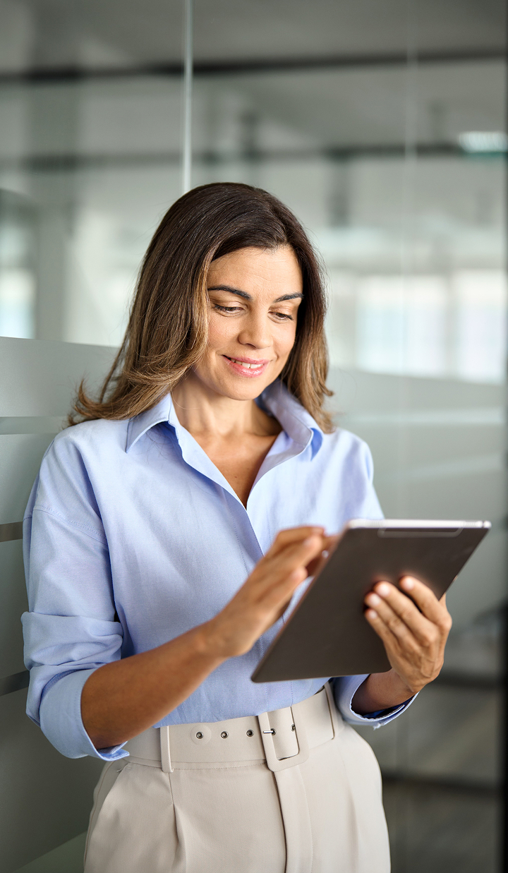 busy-middle-aged-businesswoman-manager-using-tablet