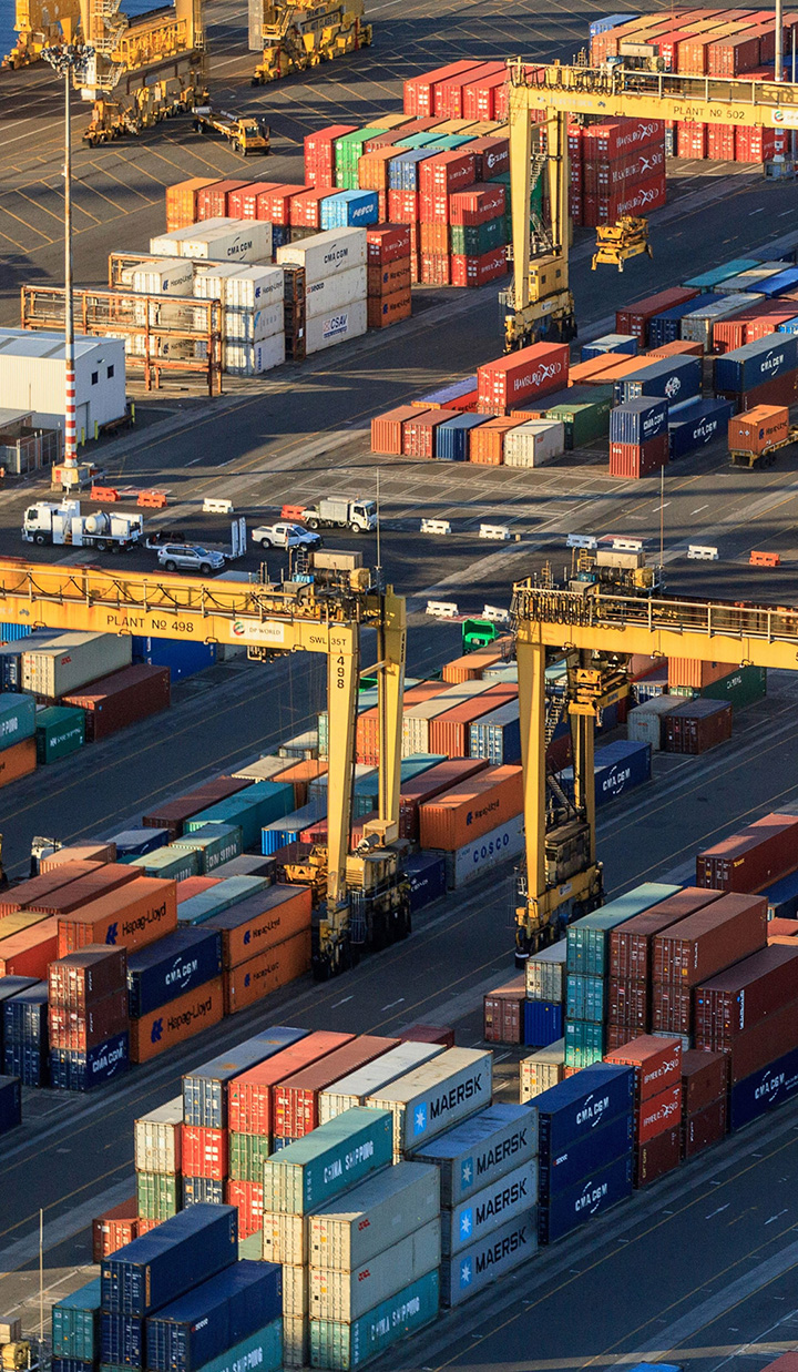 Aerial view of a port full of containers and cranes