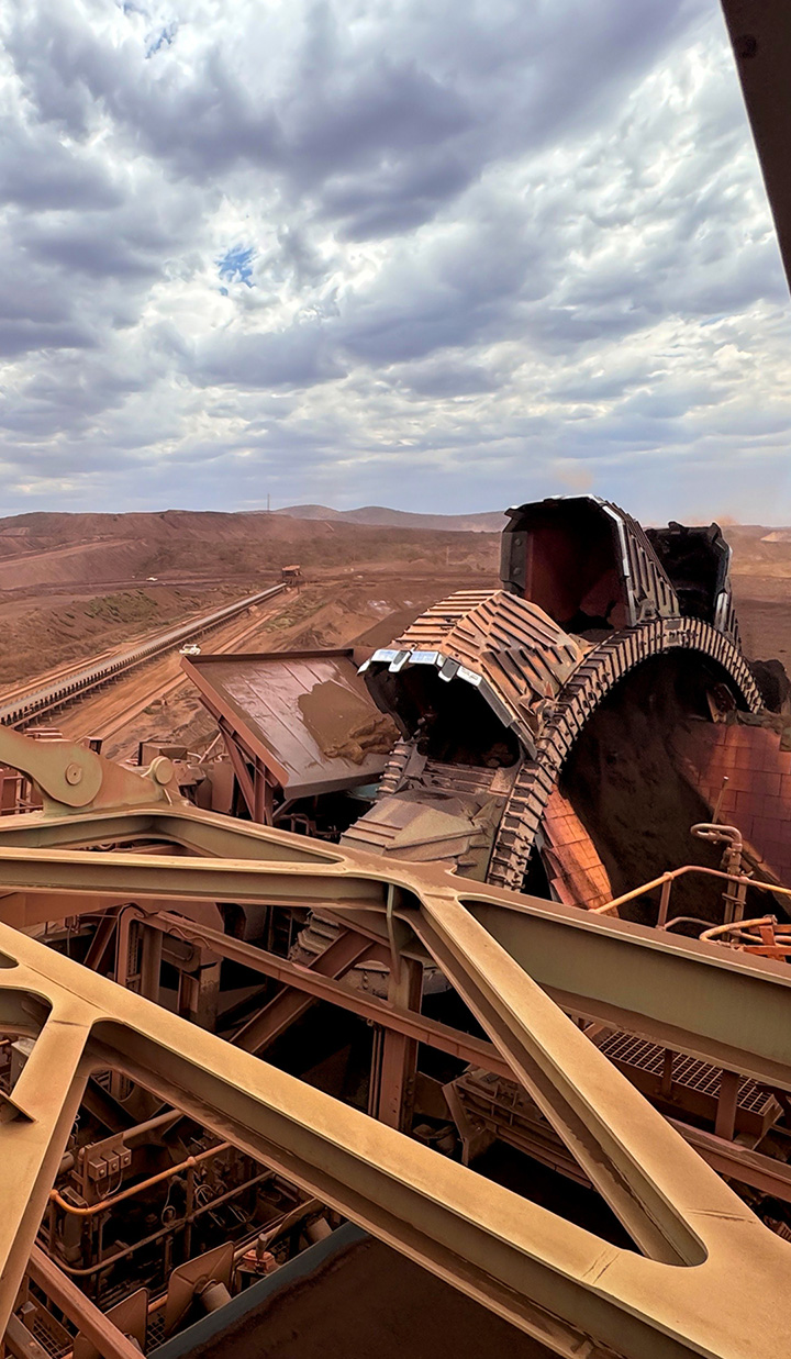 Bucket-wheel excavators in Brockman, Australia, with operators monitoring their operation.