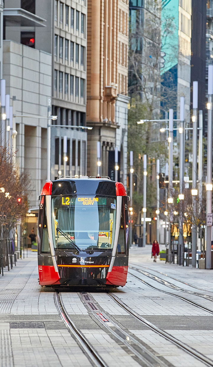 Lightrail passing through Circular Quay streets in Sydney.