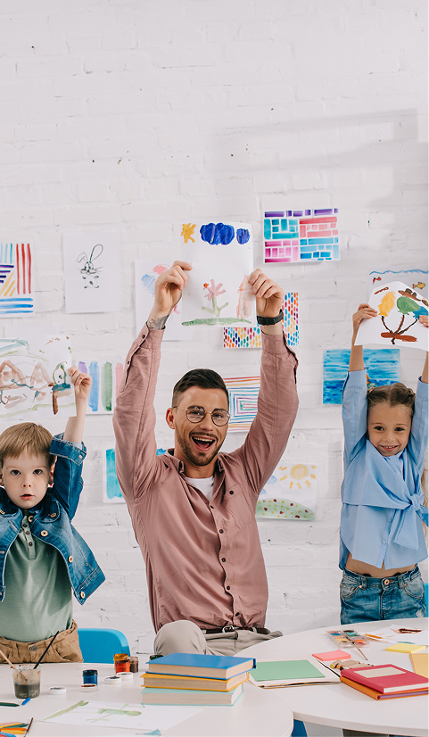 Portrait of smiling teacher and multi-ethnic children