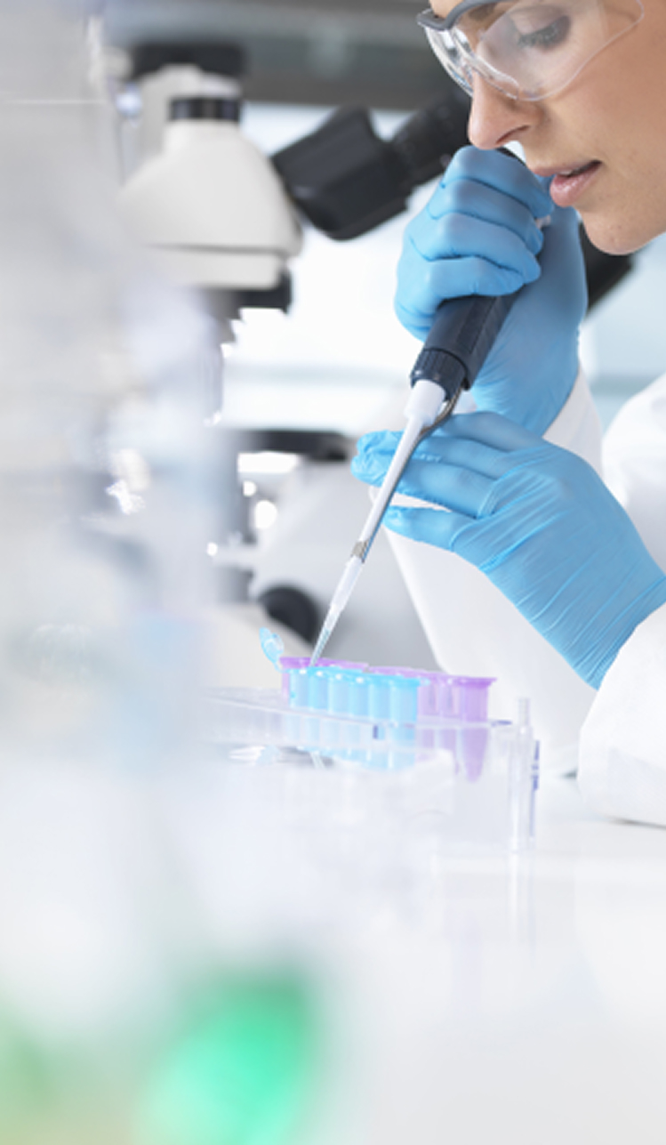 scientist-using-pipette-in-laboratory