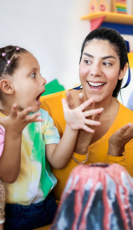 Teacher and children learn about volcanos