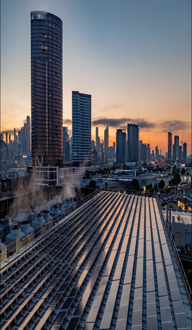 City skyline with skyscraper and solar panels