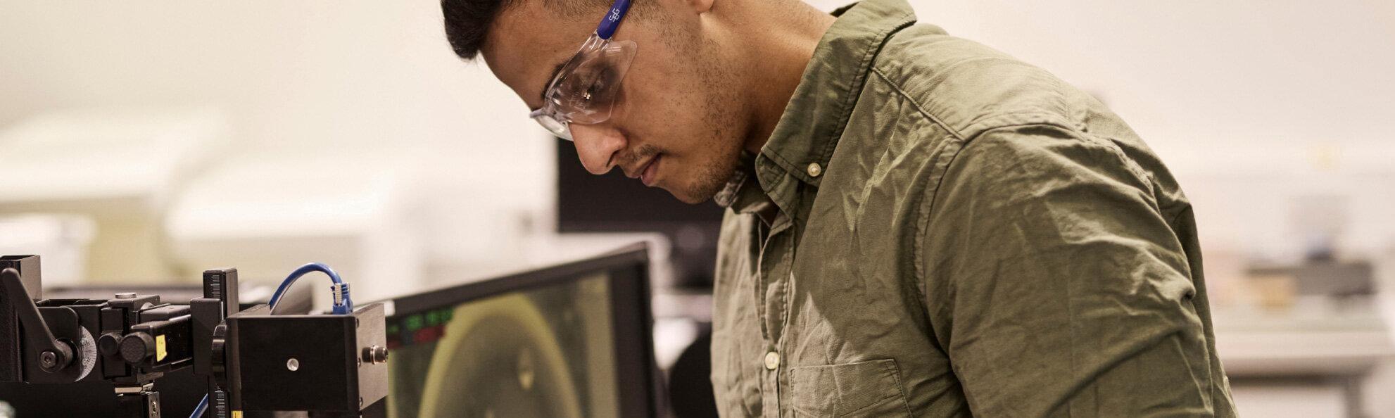 a young male working on a project